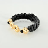 Anillo Tejido Negro Herraje Infinito 0.4 g / T7 Oro Amarillo 18K