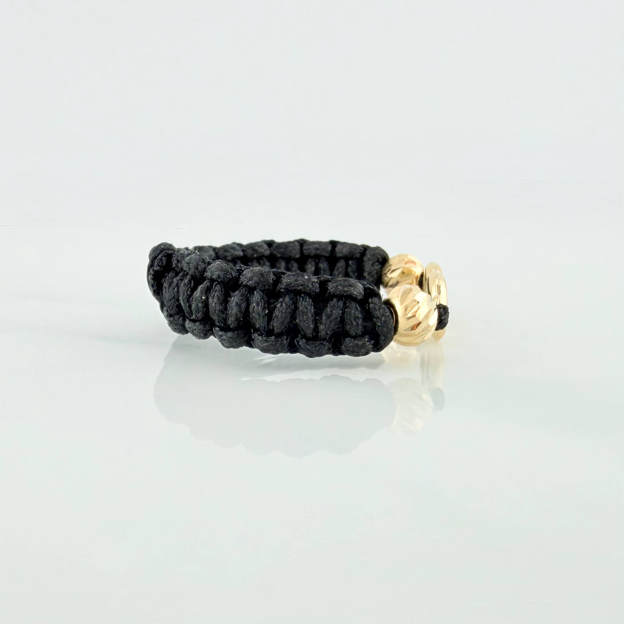 Anillo Tejido Negro Herraje Infinito 0.4 g / T7 Oro Amarillo 18K