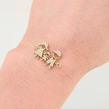 Herraje Familia Silueta 1.6gr / 1.2cm-2.3cm / Oro Amarillo 18K