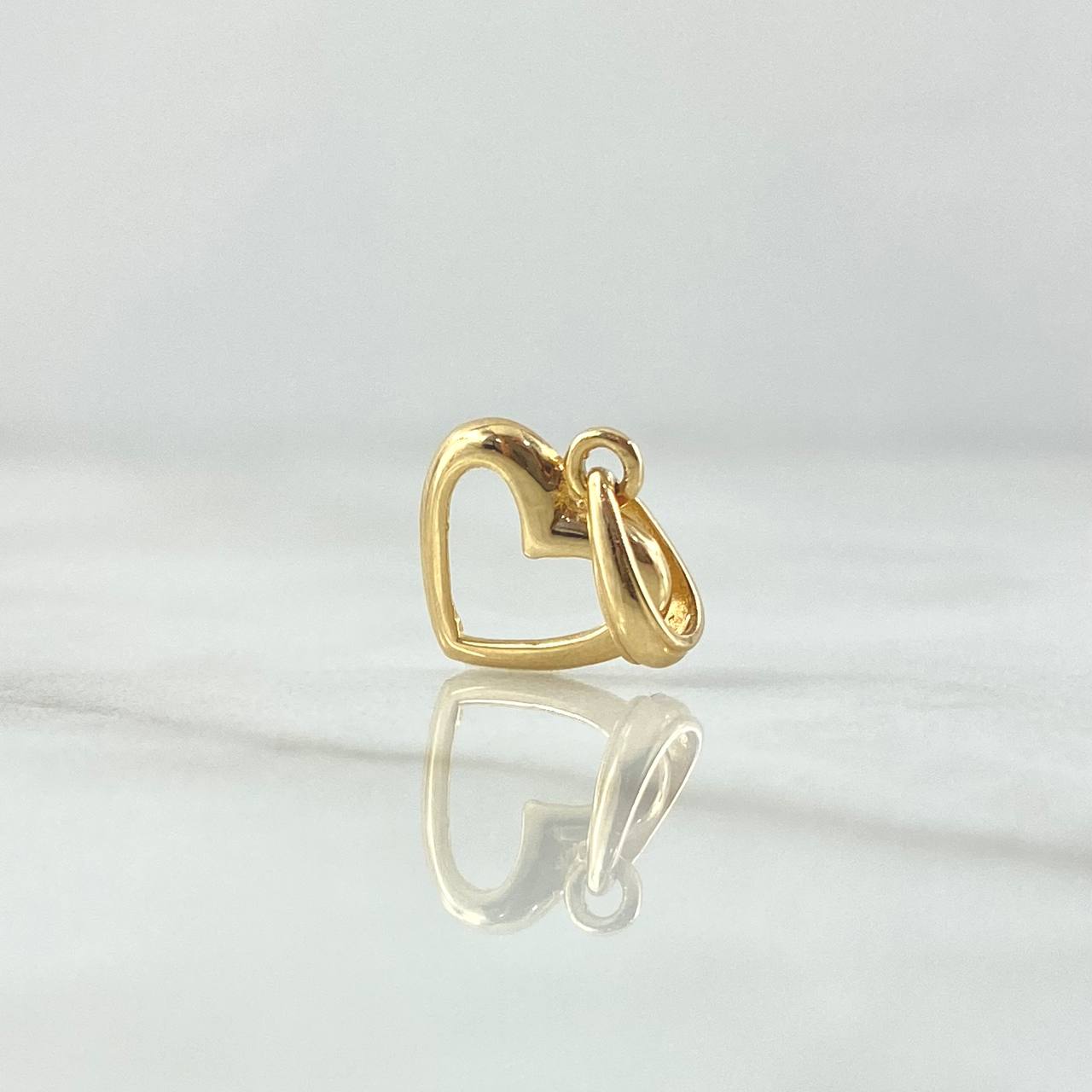 Dije Silueta Corazón 0.65gr / 1.5cm / Liso Oro Amarillo 18K