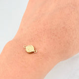 Herraje Corona Texturizada 0.3g / 1.3cm Oro Amarillo 18K