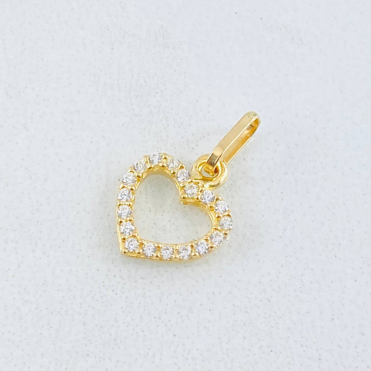 Dije Silueta Corazón Tupido 0.4gr / 1.3cm / Oro Amarillo 18K
