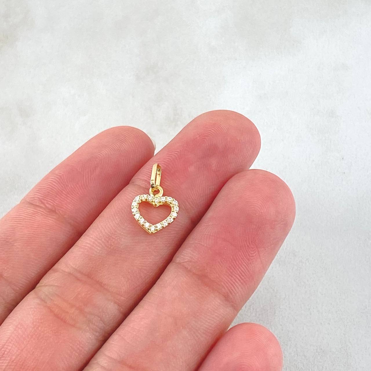 Dije Silueta Corazón Tupido 0.4gr / 1.3cm / Oro Amarillo 18K