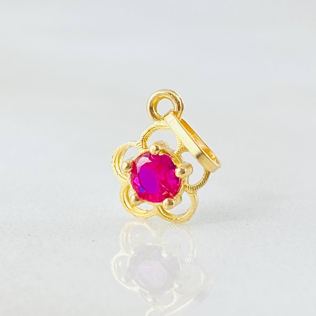 Dije Flor  0.4gr / 1.4cm / Oro Amarillo 18K