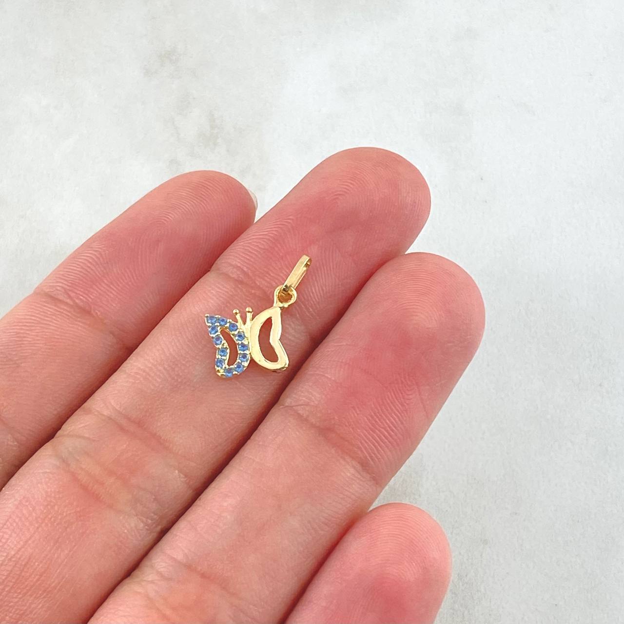 Dije Silueta Mariposa 0.5gr / 1.6cm / Oro Amarillo 18K