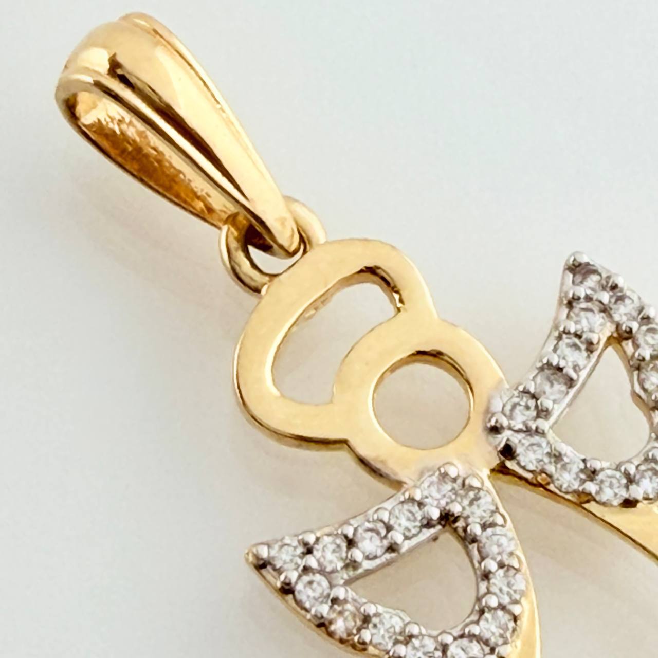 Dije Angel 1.65gr / 2.5cm / Dos Oros Amarillo Blanco 18K %