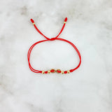 Pulsera Roja Infinito Atravezado 0.8gr / 4mm-3mm Bolas Lisas 6 und Oro Amarillo *