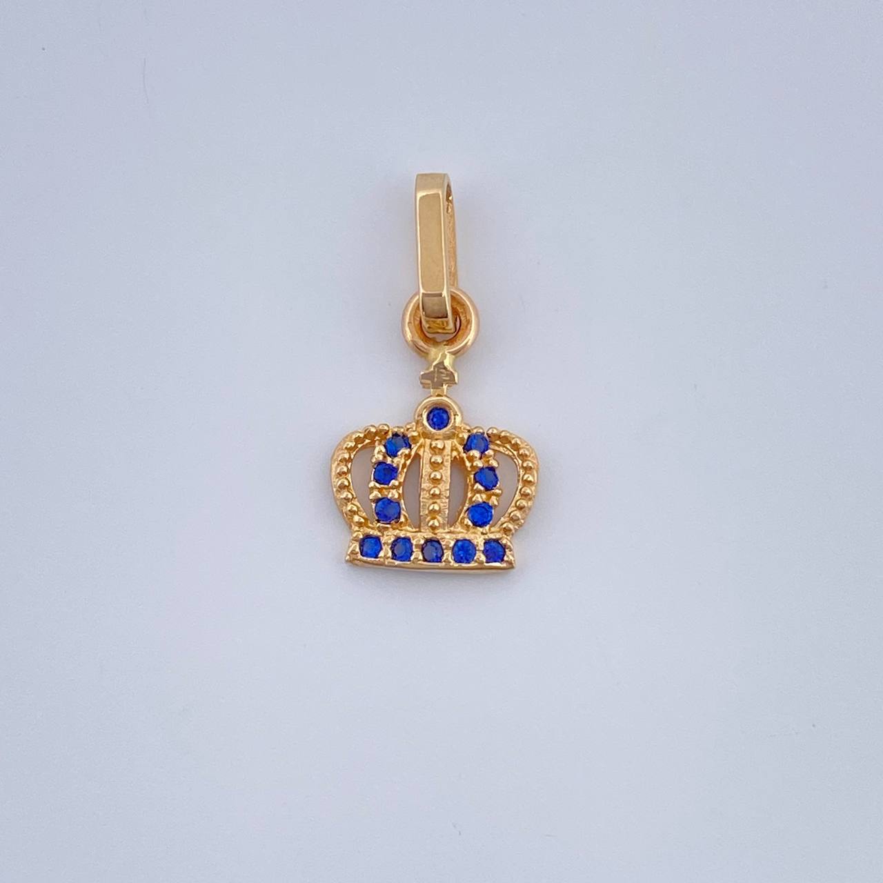 Dije Corona Real 0.7gr / 1.7cm-Oro Amarillo 18K $