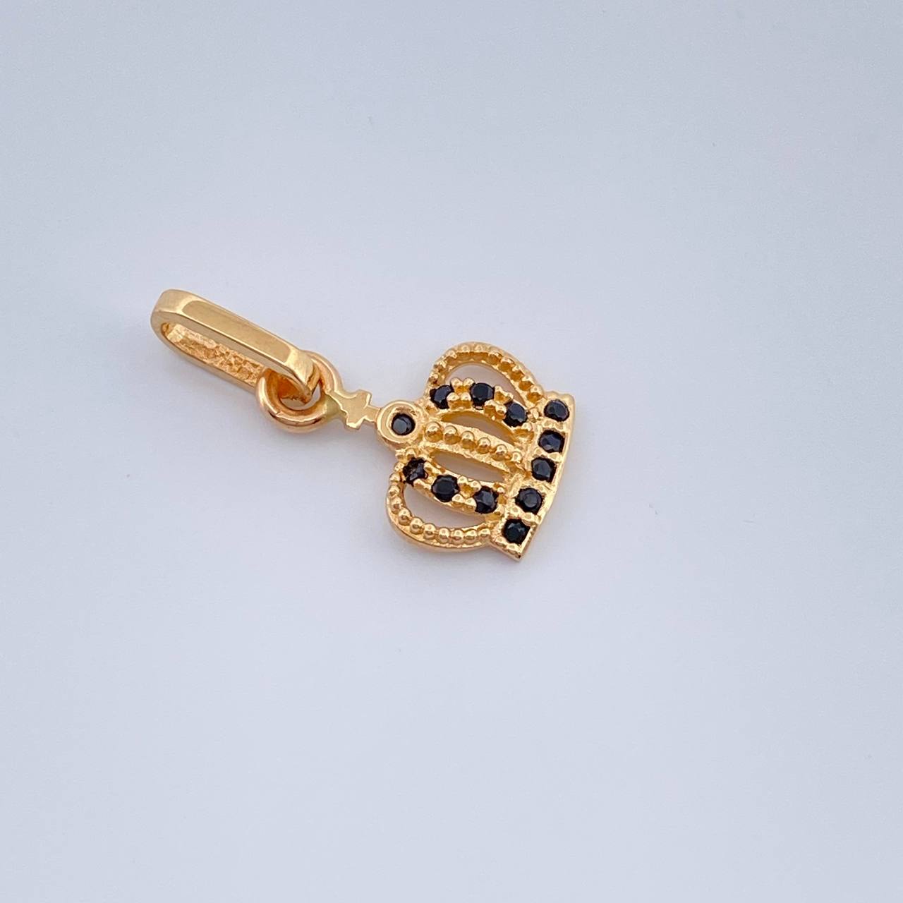 Dije Corona Real 0.75gr / 1.7cm-Oro Amarillo 18K $