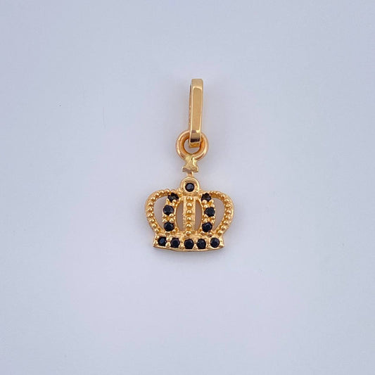 Dije Corona Real 0.75gr / 1.7cm-Oro Amarillo 18K $