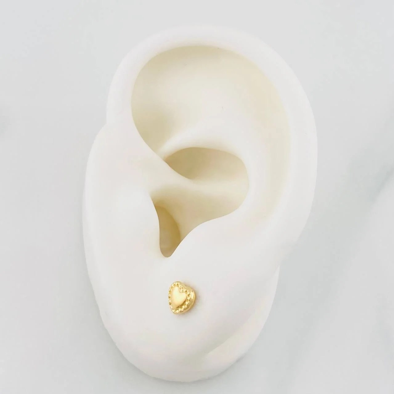 Topos Corazon Bordeado 0.5g / 5mm Oro Amarillo 18K