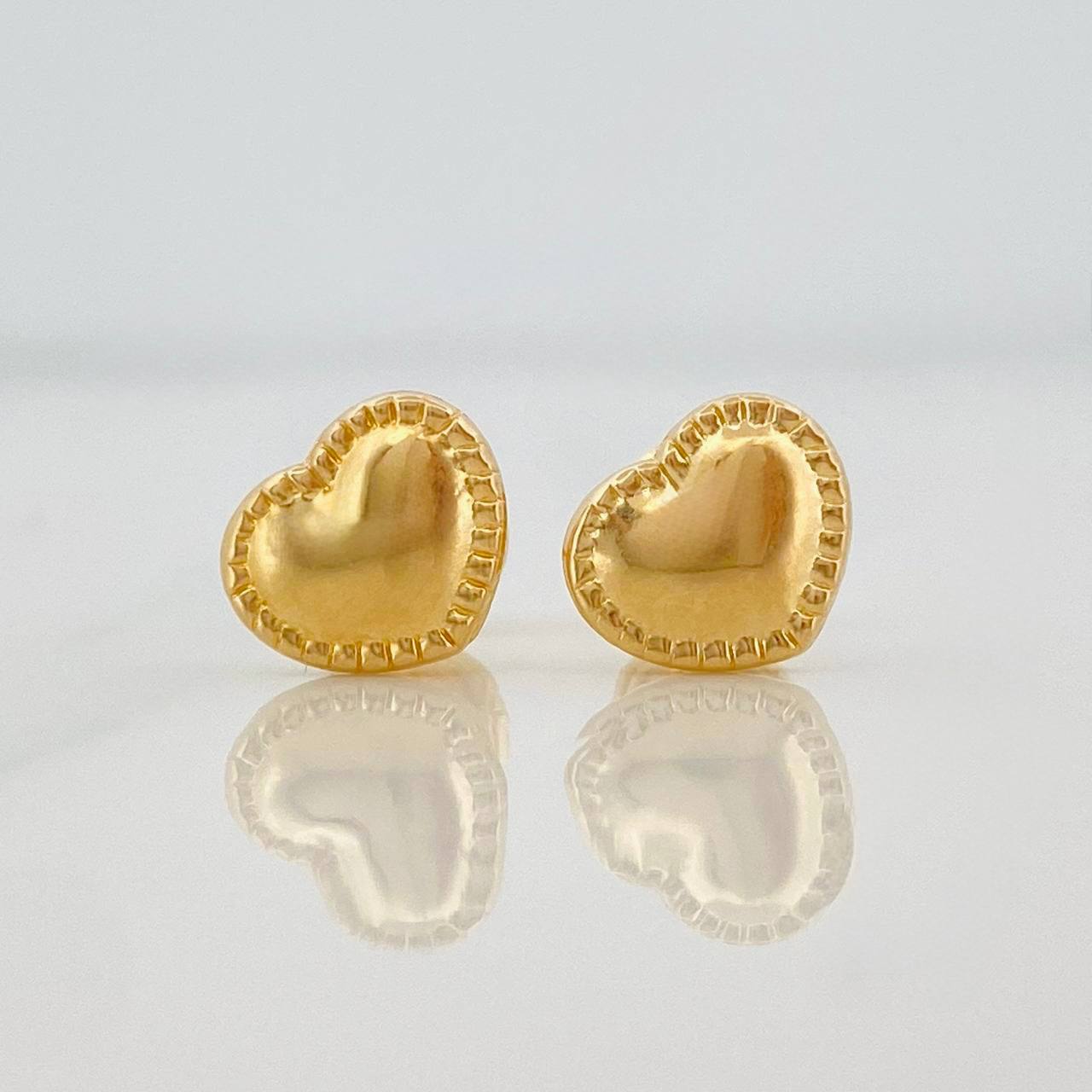 Topos Corazon Bordeado 0.7g / 7.5mm Oro Amarillo 18K