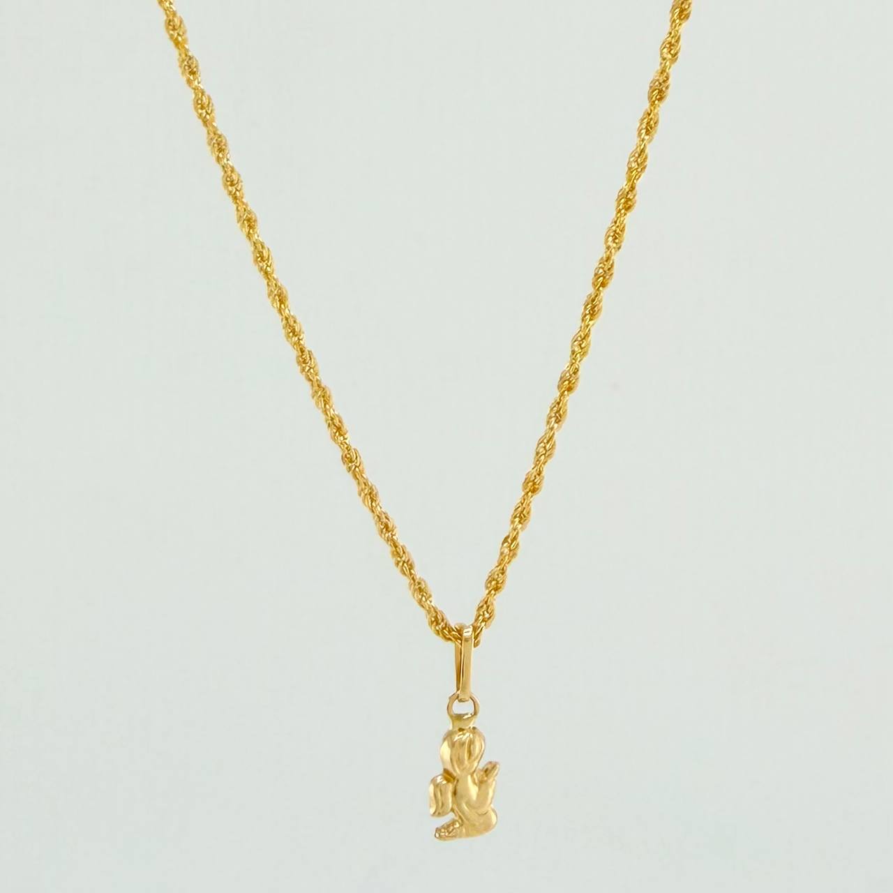 Set Cadena y Dije Lazo + Angel De La Guarda 1.25gr / 50cm / 1.12mm Oro Amarillo 18K (Oferta) $