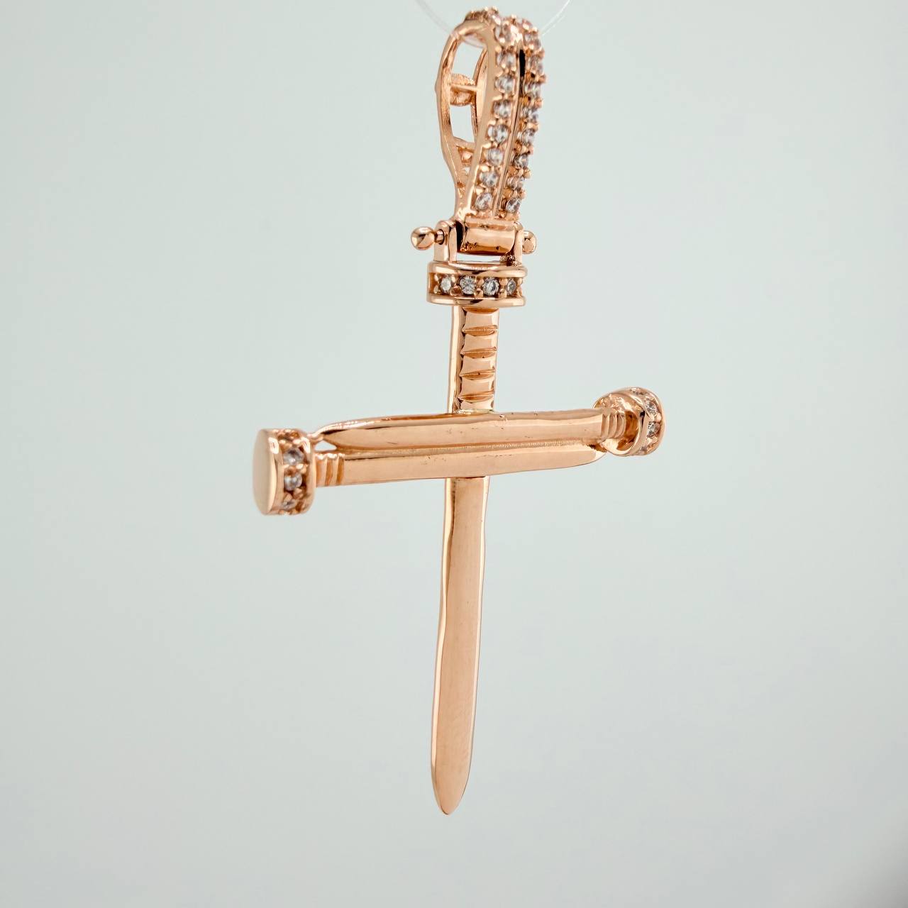 Dije Cruz Clavo 4.15gr / 4.6cm / Oro Rosa 18K $