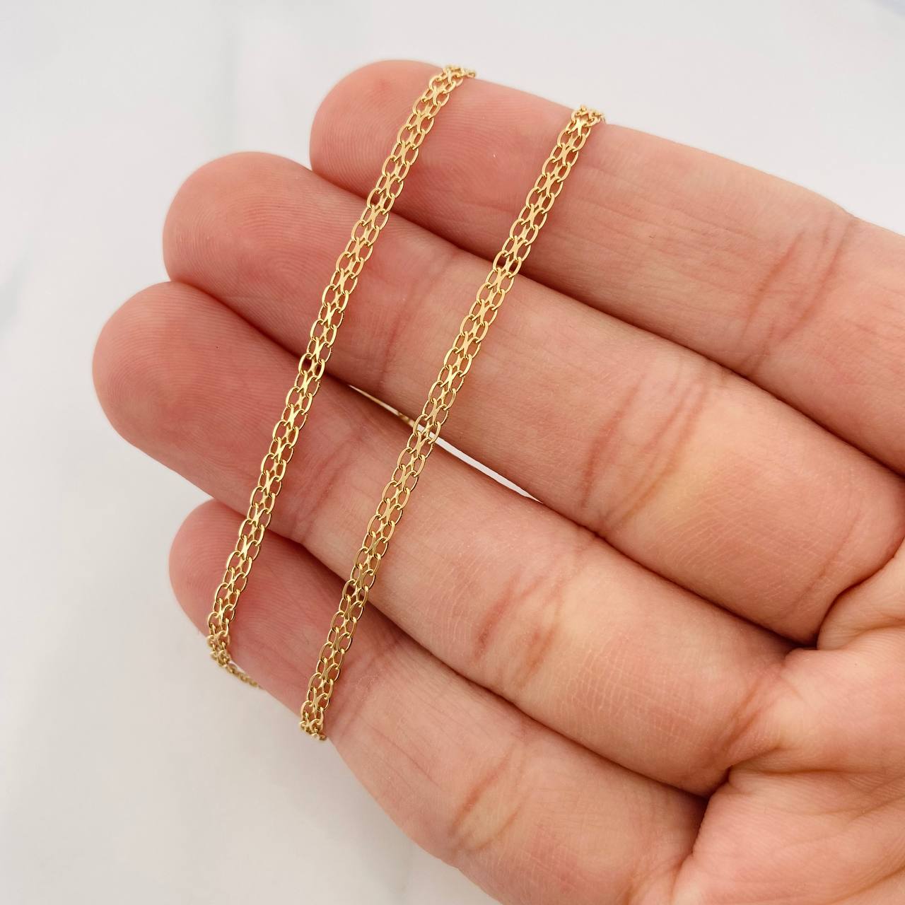 Cadena China 6.95g / 60cm / 2.81mm Oro Amarillo 18K