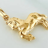 Dije Caballo 0.9 g / 2.5 cm Oro Amarillo 18K