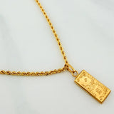 Set Cadena Lazo + Dije One Dolar / 3.55gr / 60.4 cm Oro Amarillo 18K