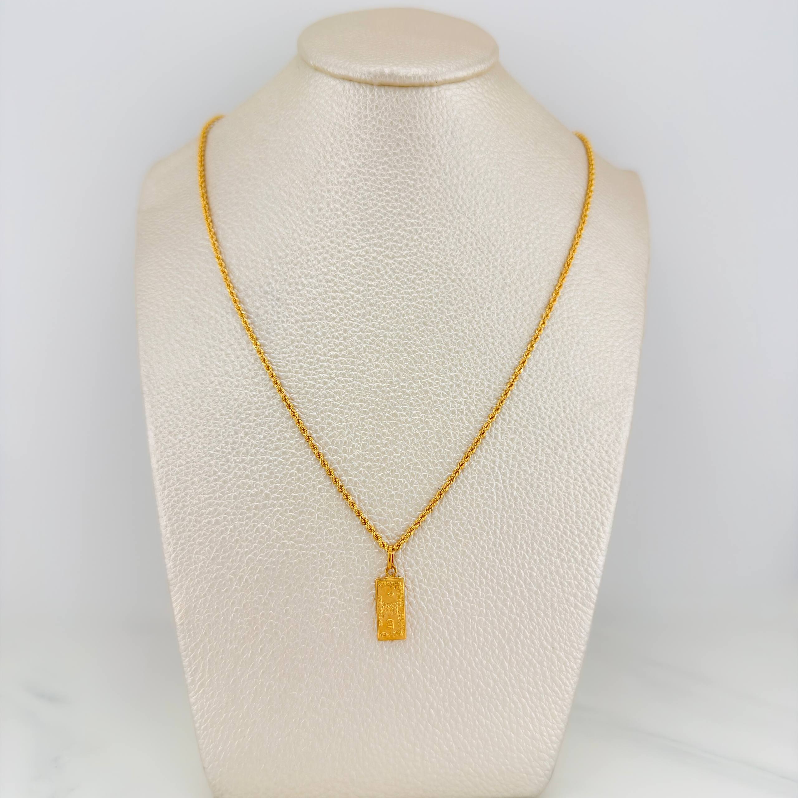 Set Cadena Lazo + Dije One Dolar / 3.55gr / 60.4 cm Oro Amarillo 18K