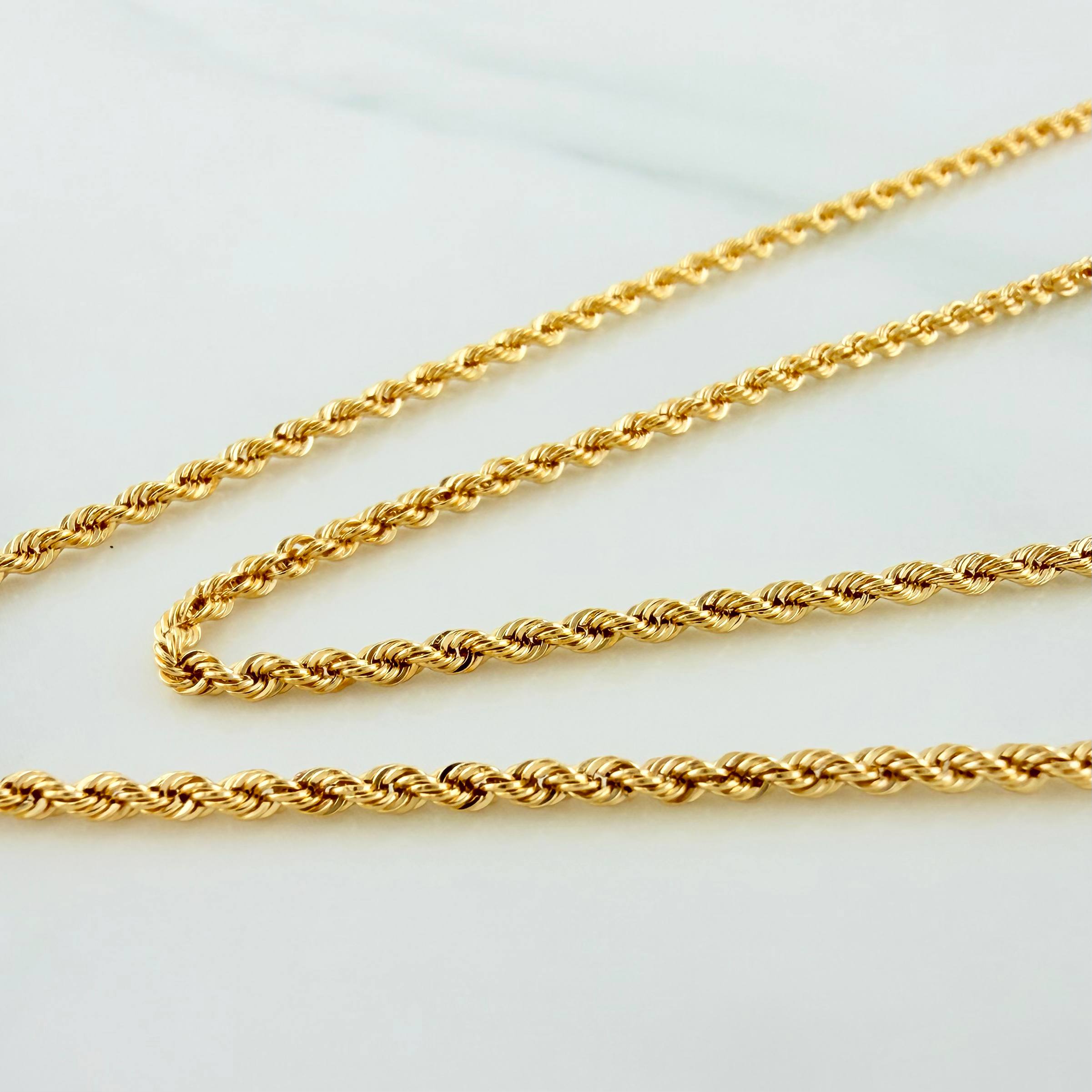 Set Cadena Lazo + Dije Herradura Caballo / 3,6gr / 60.3 cm Oro Amarillo 18K