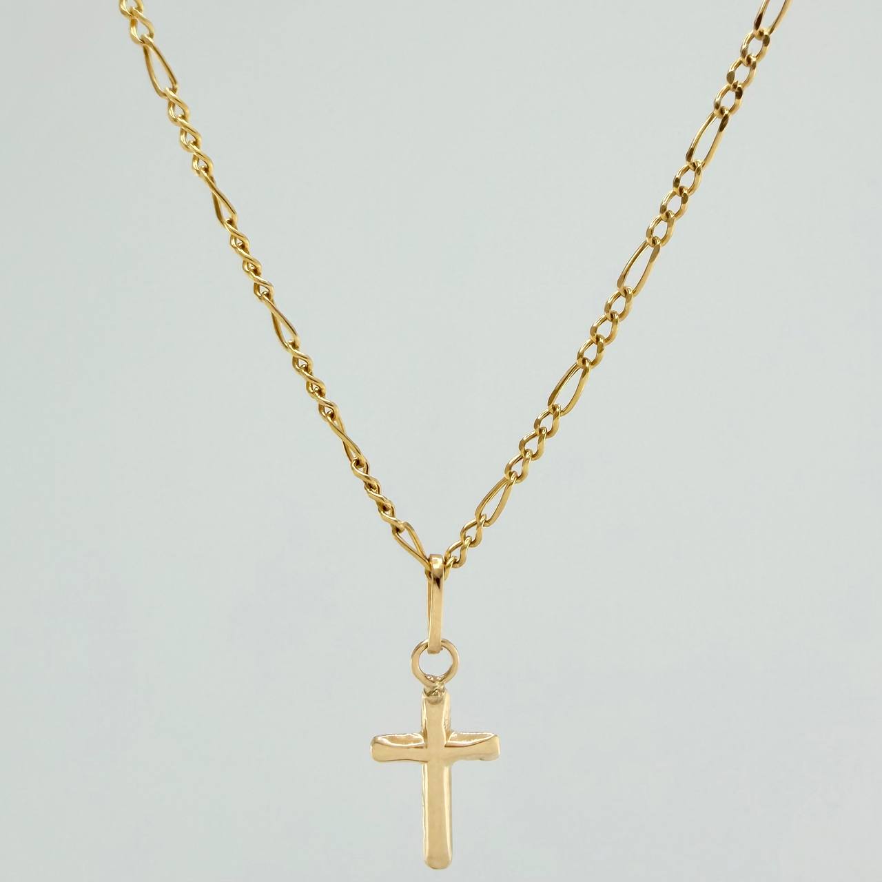 Set Cadena y Dije Figaro + Cruz 1.4gr / 50cm / 1.25mm Oro Amarillo 18K (Oferta) $