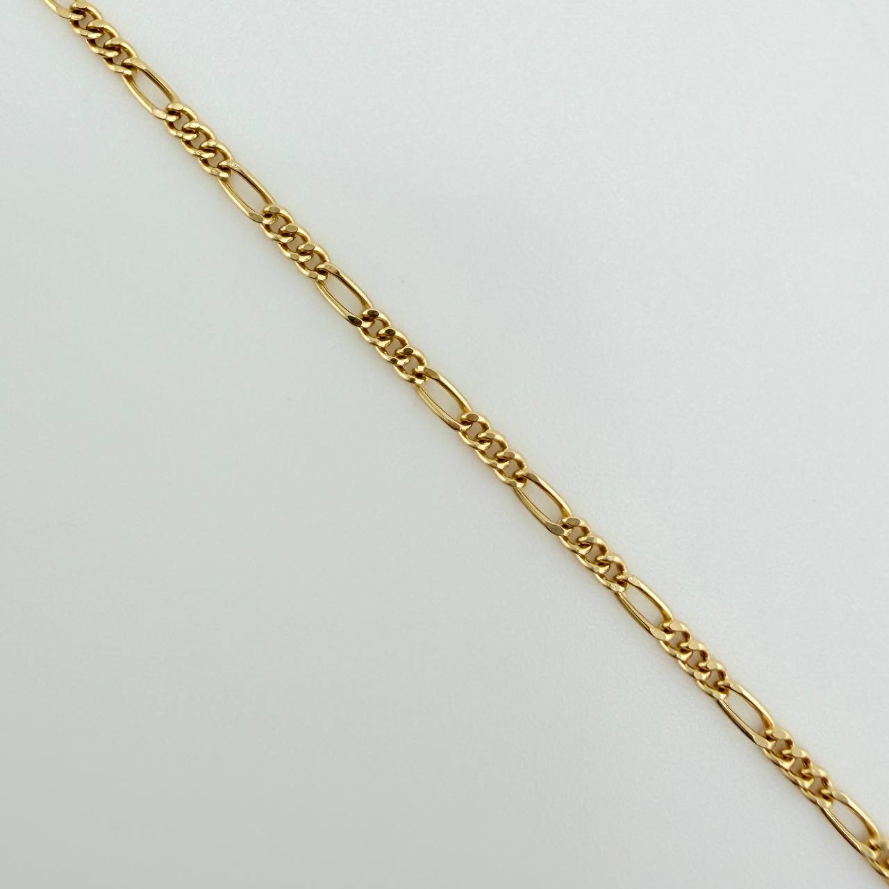 Set Cadena y Dije Figaro + Cruz 1.7gr / 50.1cm / 1.25mm Oro Amarillo 18K (Oferta) $