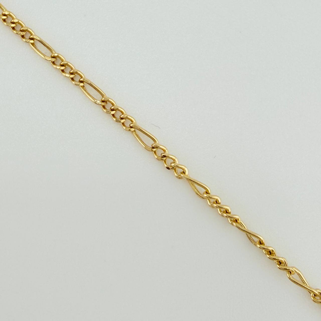 Set Cadena y Dije Figaro + San Benito 1.85gr / 50.3cm / 1.27mm Oro Amarillo 18K (Oferta) $