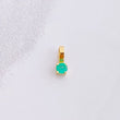 Dije Redondo Esmeralda 5pts 0.15g / 0.6cm Oro Amarillo 18K