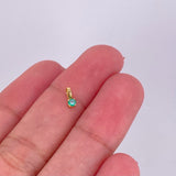 Dije Redondo Esmeralda 5pts 0.15g / 0.6cm Oro Amarillo 18K