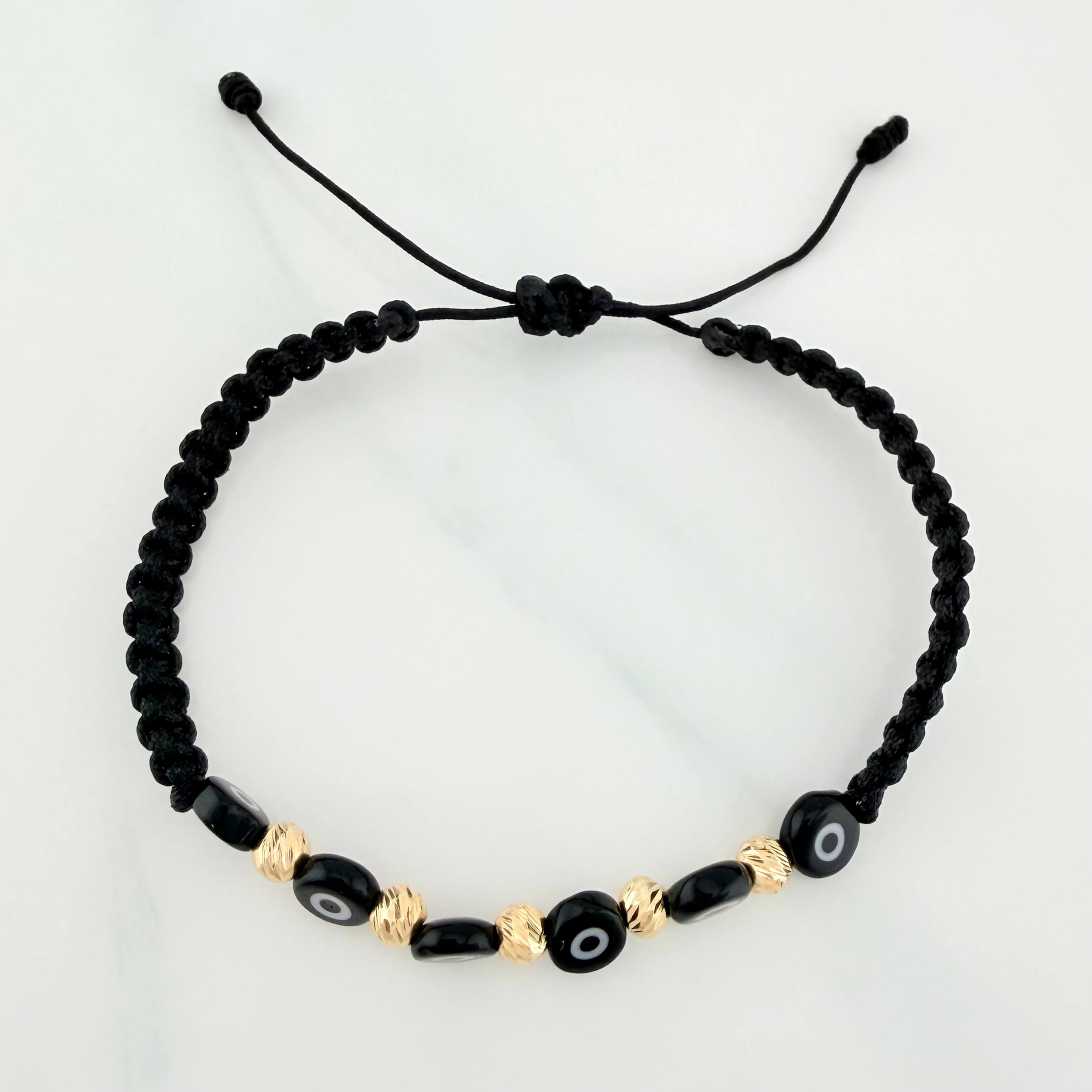 Pulsera Tejida Negra Ojos Turcos Negros Bolas Diamantadas 5Und Oro Amarillo 18K