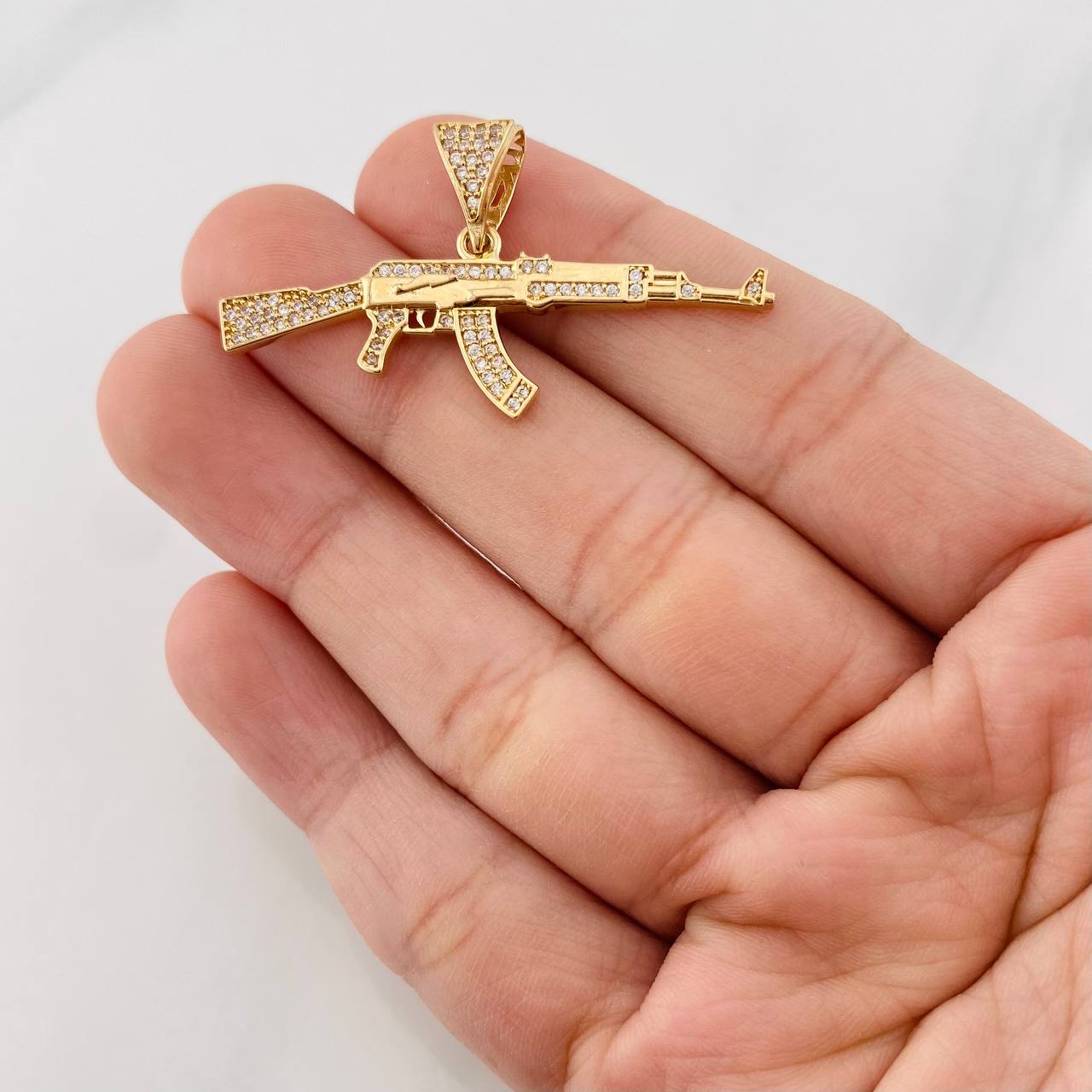 Dije Fusil 3.5g / 2cm Oro Amarillo 18K