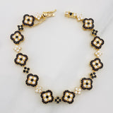 Pulso Trebol Flores 15.60g / 18.05cm / 10.13mm Oro Amarillo 18K