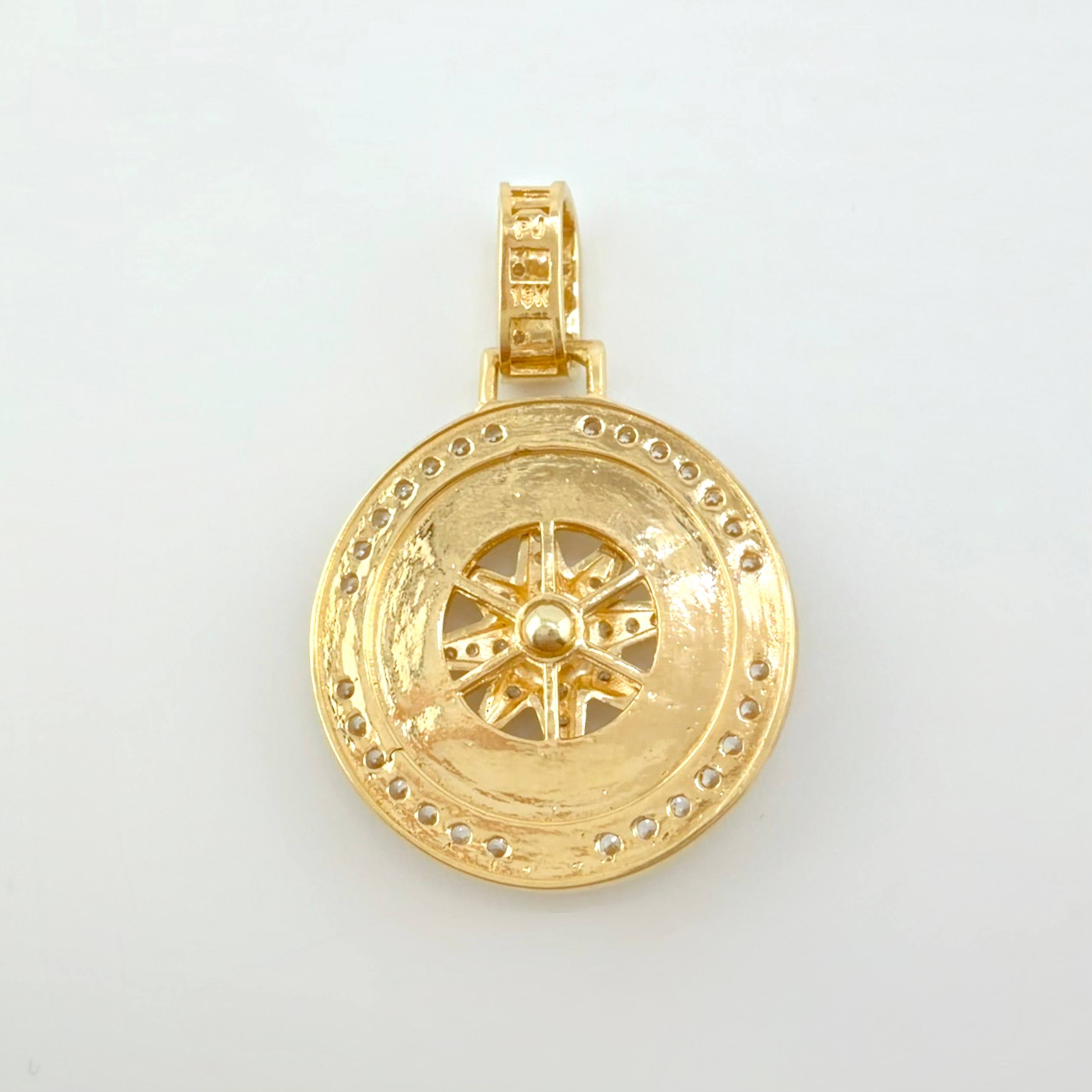 Dije Brujula Movil 9.6gr / 3.8cm / Oro Amarillo 18K ©