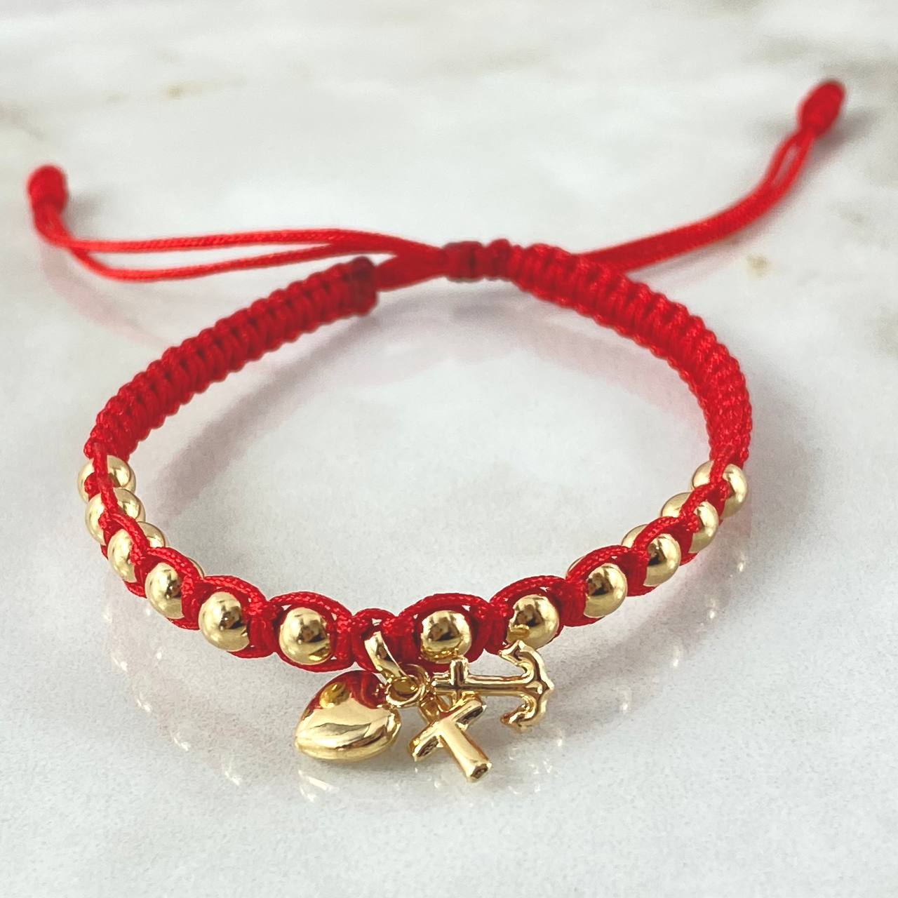 Pulsera Roja Dije Tres Gracias 1.65gr / 4mm Bolas Lisas 12 und Oro Amarillo 18K  ©