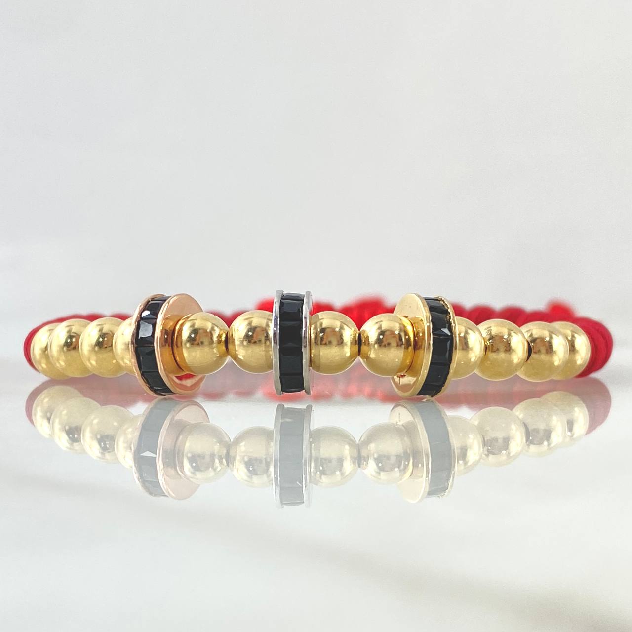 Pulsera Roja Herraje Rueda 4.55gr / 5mm Bolas Lisas 12 und Tres Oros 18K ©