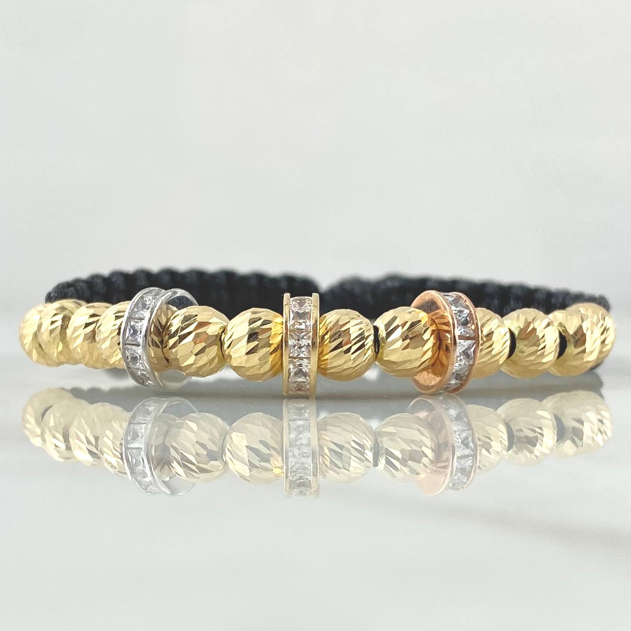 Pulsera Negra Herraje Rueda 6gr / 6mm Bolas Diamantadas 12 und Circones Blancos Tres Oros 18K ©
