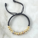 Pulsera Negra Herraje Rueda 6gr / 6mm Bolas Diamantadas 12 und Circones Blancos Tres Oros 18K ©