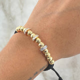 Pulsera Negra Herraje Rueda 6gr / 6mm Bolas Diamantadas 12 und Circones Blancos Tres Oros 18K ©