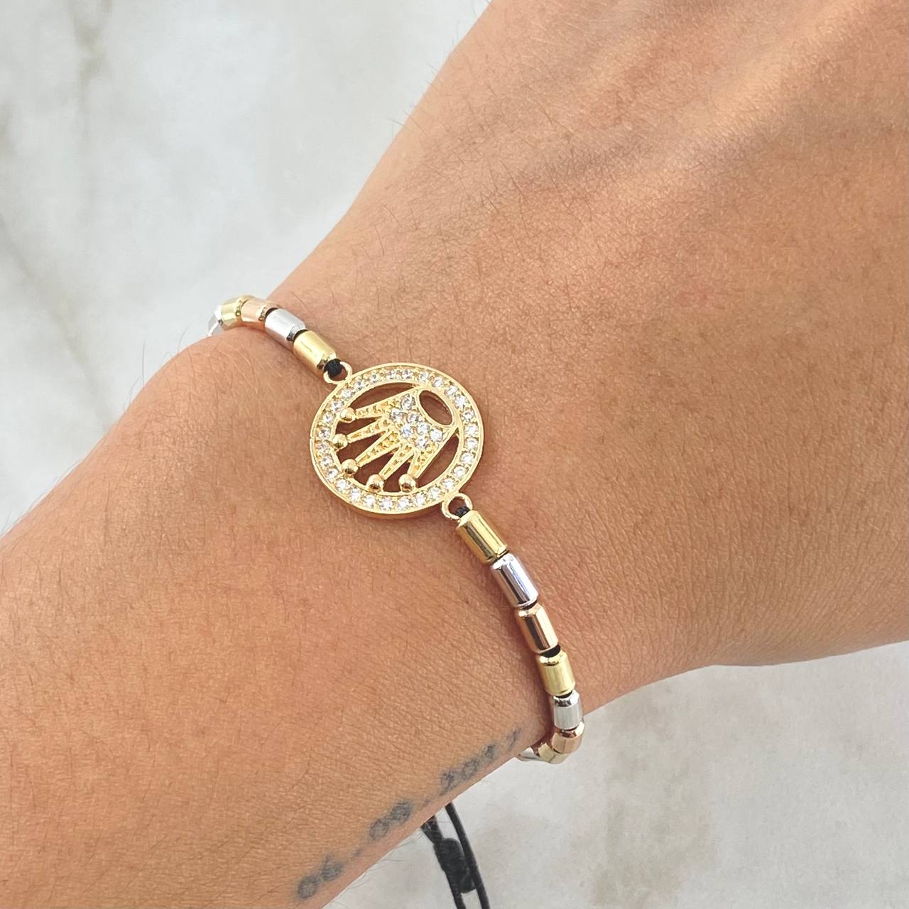 Pulsera Negra Herraje Circulo Corona RX 4gr / 3mm Cilindros Lisos 14 und Circones Blancos Tres Oros 18K ©