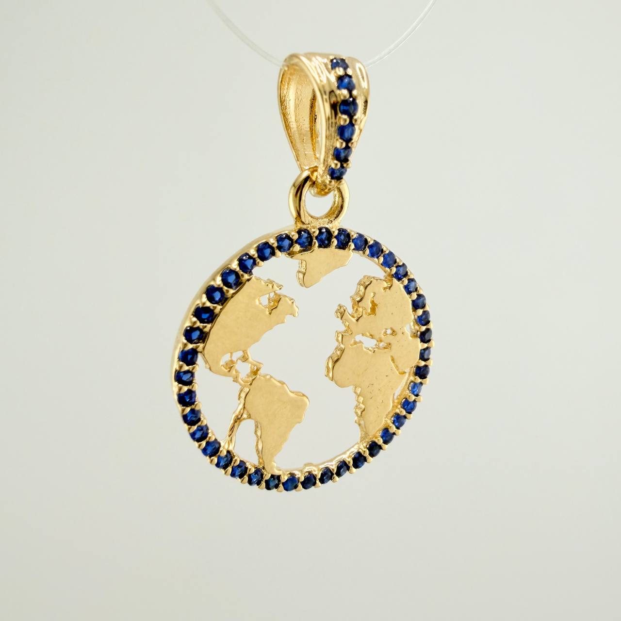 Dije Silueta Tierra 2gr / 2.5cm / Oro Amarillo 18K