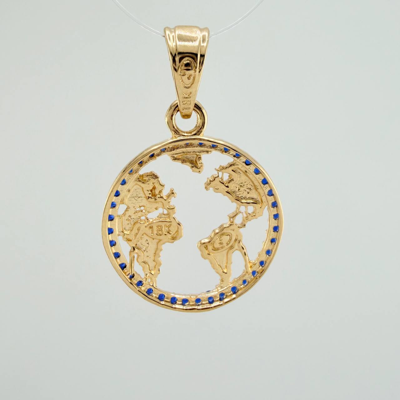 Dije Silueta Tierra 2gr / 2.5cm / Oro Amarillo 18K