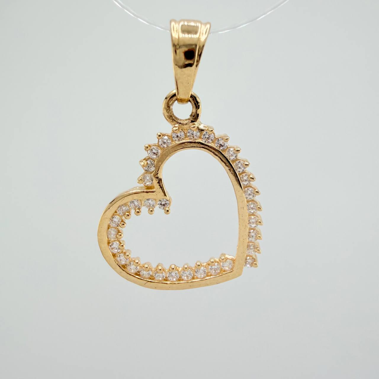 Dije Silueta Corazon  1.2gr / 2.1cm / Oro Amarillo 18K &