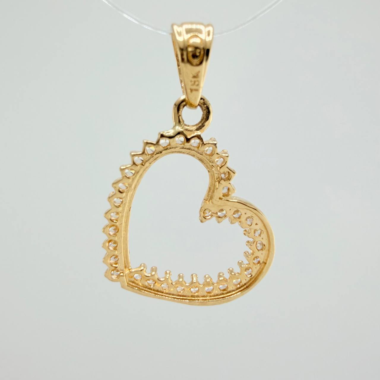 Dije Silueta Corazon  1.2gr / 2.1cm / Oro Amarillo 18K &