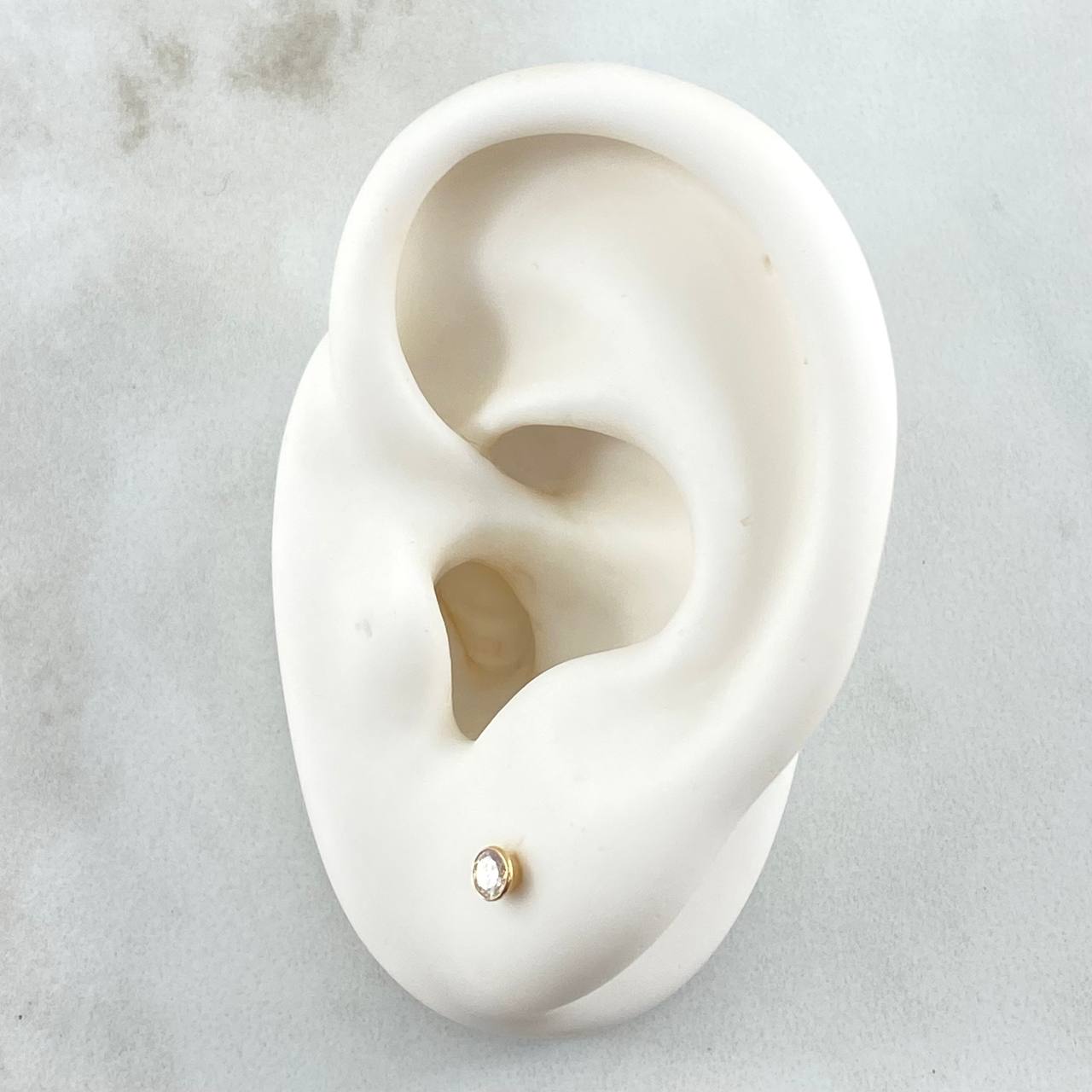 Topos Bisel 0.45gr / 3.2mm Circon Blanco Oro Amarillo 18K (Joya) *