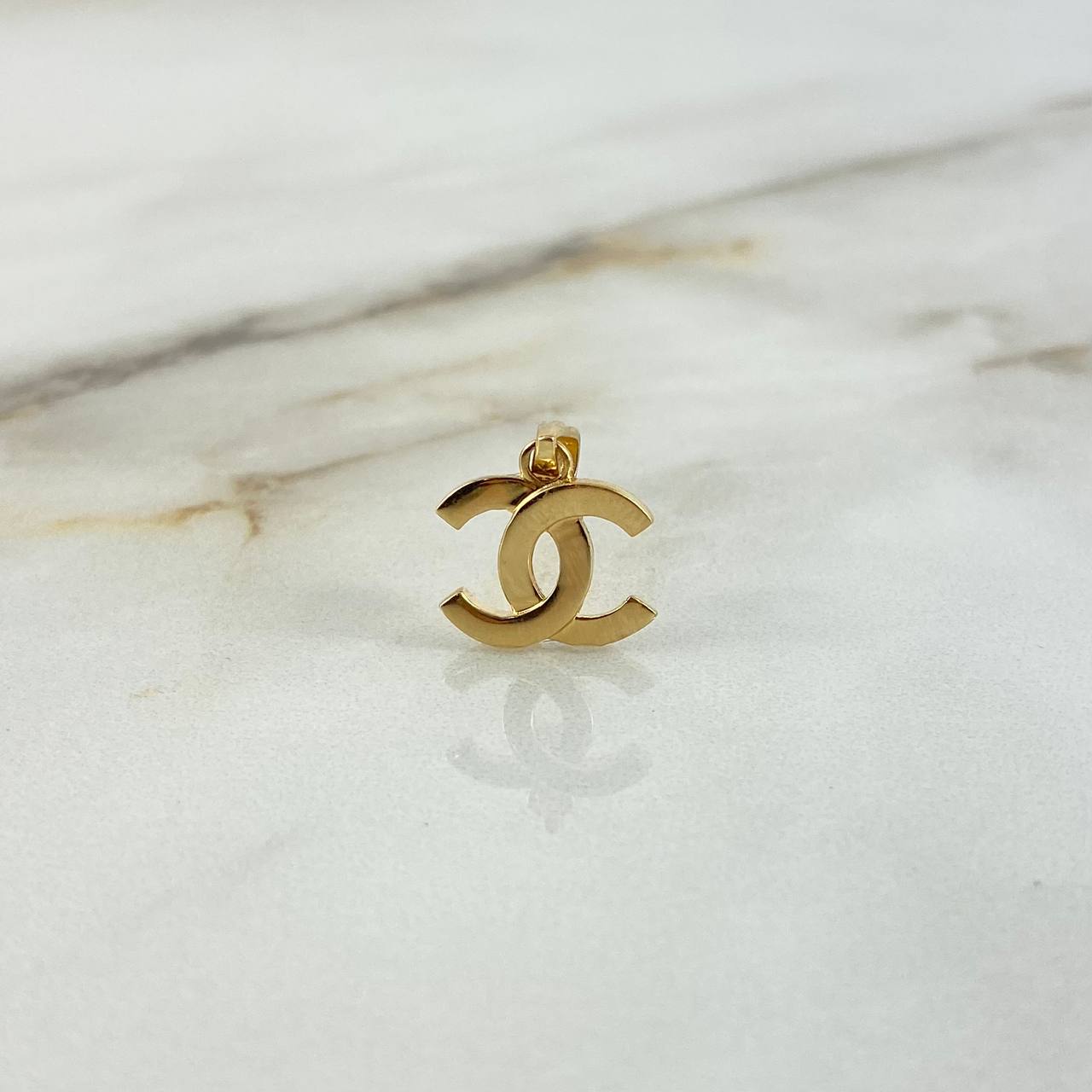 Dije CC 1.05gr / 1.8cm / Oro Amarillo +3 ©