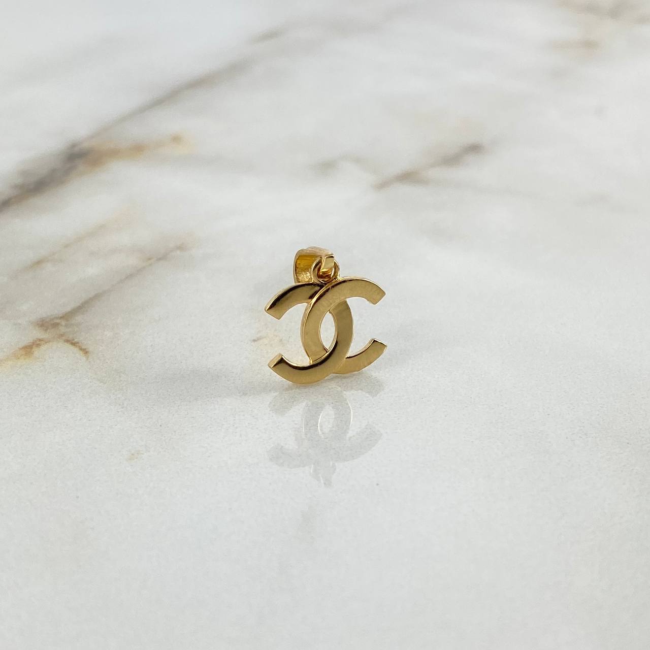 Dije CC 1.05gr / 1.8cm / Oro Amarillo +3 ©