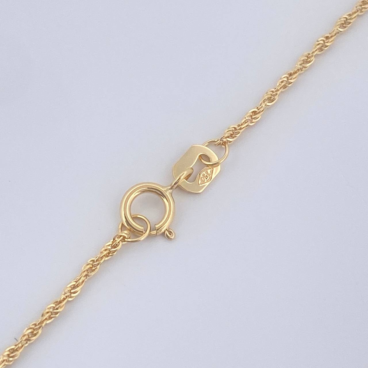 Set Cadena y Dije Lazo + Cruz 1.45gr / 40cm / Oro Amarillo 18K (Oferta) &