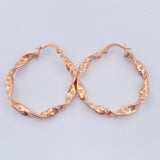 Candongas Tata 2.95gr / 3.7cm / Oro Rosa 18K $