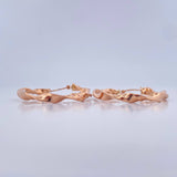Candongas Tata 2.95gr / 3.7cm / Oro Rosa 18K $