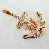 Dije Cruz Cristo Ancla 6.85gr / 4.1cm / Oro Rosa 18K $