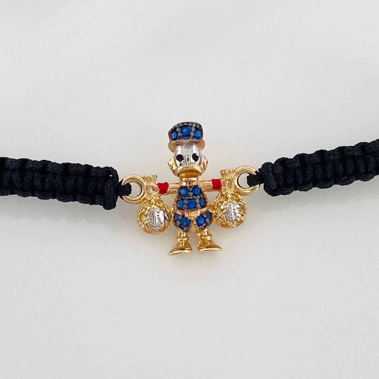 Pulsera Tejida Negra Pato Bolsa de Dinero 1.55gr / Tres Oros 18K &